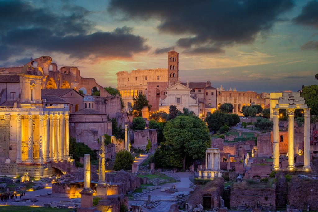 Forum Romanum and Colosseum in Rome with dramatic colorful sky